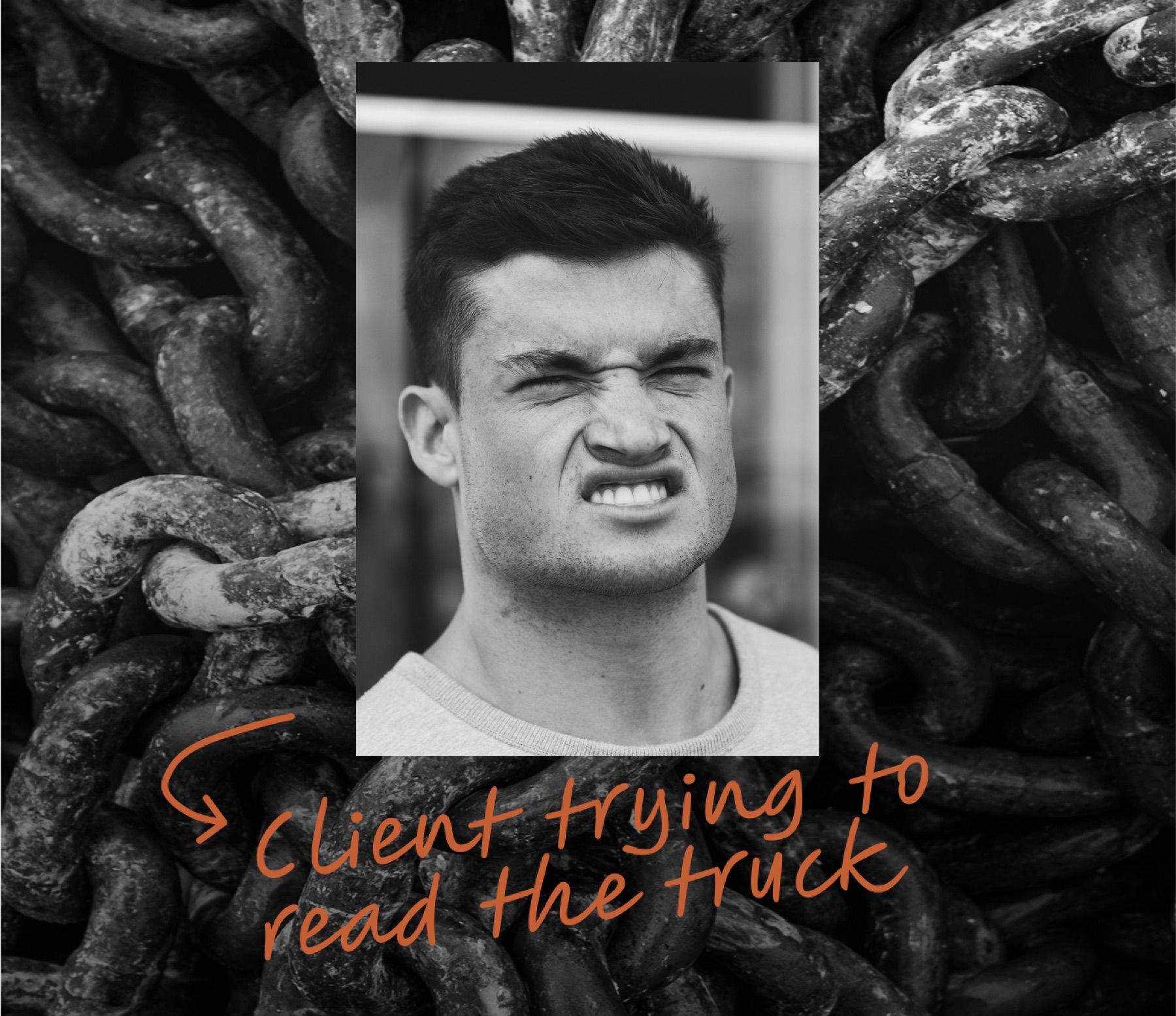 A frustrated business owner pictured against a heavy chain